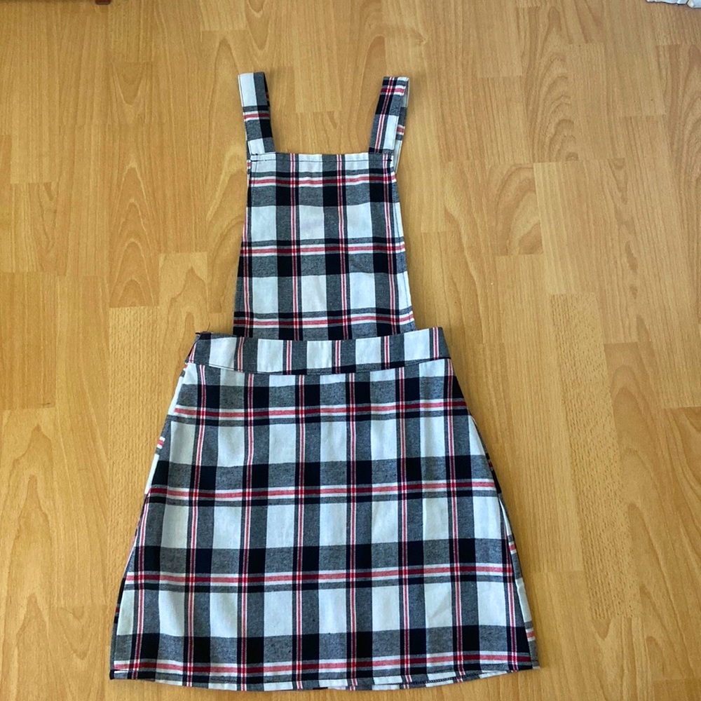 Black, red, and white plaid apron dress